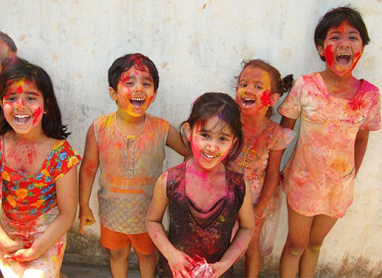 how to get holi powder out of clothes